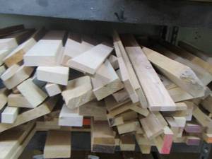 lot 64 image: large lot of misc. various sizes of cut wood