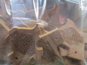 lot 86 image: Harley Davidson wood pieces Texas shape