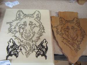 lot 99 image: carved wooden bear on arrow, bear with wolves