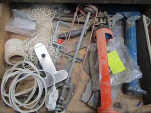lot 272 image: caulking guns, small extension cord and more