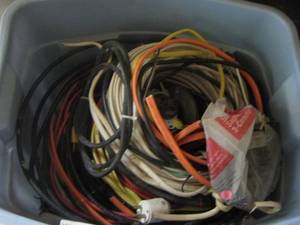 lot 314 image: light blue tote of extension cords