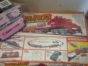 lot 483 image: train set with cars and tracks by Tyco 72 pieces, comes with electrical components and more