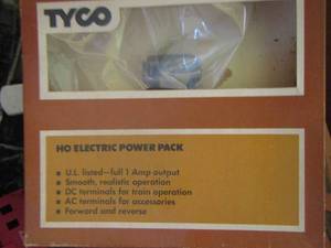 lot 430 image: Tyco train pieces - track cars and more