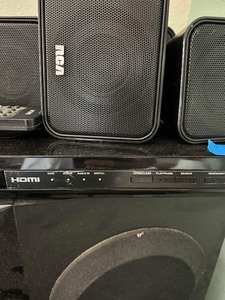 lot 393 image: rca dvd player- 5 mini speakers