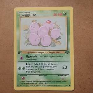 lot 12 image: 1st Edition Pokemon Exeggcute 5264 Common NMM