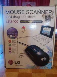 lot 42 image: NIB LG mouse scanner