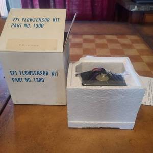 lot 126 image: NOS EFI Flow Sensor Kit in box with instructions