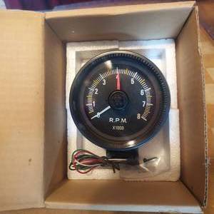 lot 127 image: NOS Electronic Tachometer