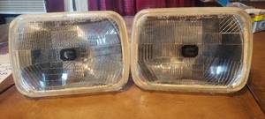 lot 129 image: Vintage NOS CIBI Square headlight assemblies