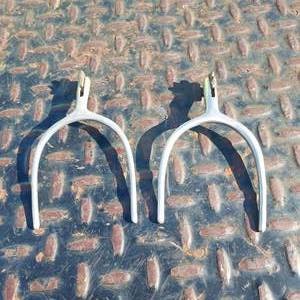 lot 142 image: Vintage pair of slip on spurs with mini rowell