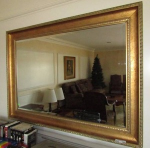 lot 360 image: Ornate framed bevel edged wall mirror