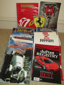 lot 399 image: Ferrari publications and large Ferrari decal
