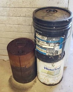 lot 28 image: Lot of Wood Sealer & 5-Gallon Transmission Fluid