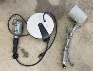 lot 74 image: Retractable Reel Shop Light & Vintage Table Mounted Drafting Table  Shop Light
