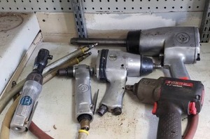 lot 142 image: Pneumatic tools including Ingersoll Rand impact driver, Chicago pneumatic air wrench, Sanborn impact wrench, Vanguard pneumatic ratchet (Bid is times the quantity of 5)