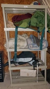 lot 270 image: Plastic Shelf w Contents.  Moving Blankets & Horse Blankets