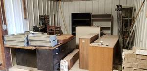 lot 280 image: Contents of Room.  Lot of Misc Vintage Desks, Cabinets, Shelving & Pavers