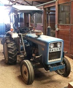 lot 282 image: Beautiful 1982 Ford 1900 Tractor, Made in Japan. Has Keys. Tractor used roughly 3 years ago to mow & was parked.  Has been sitting ever since. SEE DESCRIPTION FOR IMPORTANT PICK UP INFORMATION REGARDING THIS ITEM