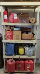 lot 476 image: Plastic storage shelf plus contents including fuel cans, assorted hardware and more as shown