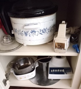 lot 345 image: Assorted counter top appliances and cooking dishes including a Crock pot, blender motor, Corelle baking dish plus