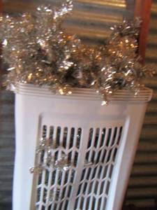 lot 19 image: Silver colored Christmas tree with assembly pre lite in basket