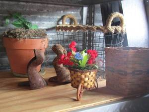 lot 40 image: Metal wine basket- wicker basket planter and more