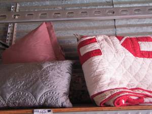 lot 45 image: Throw pillows and red and white quilt