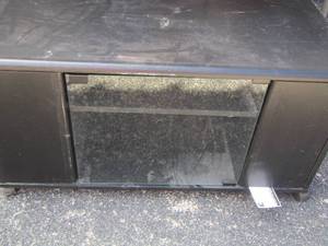 lot 106 image: Small rolling TV stand