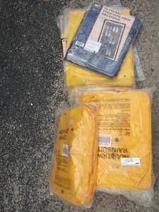 lot 122 image: Industrial yellow rain suits