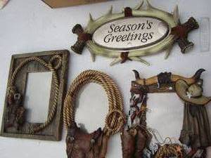 lot 142 image: Western style picture frames, a few have antlers  qty 5 per