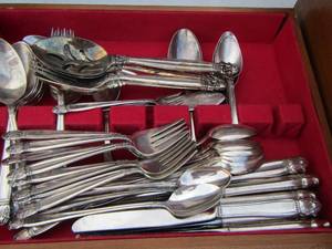 lot 172 image: 50 piece set of HOLMES & EDWARDS  inlaid silverware- plus 6 serving pieces