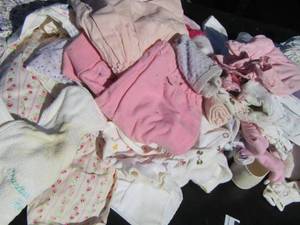 lot 198 image: Small lot of newborn baby girl clothes- socks all vintage
