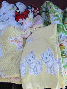lot 200 image: Vintage baby blankets- Winnie the pooh crib bumpers- vintage mom carry baby wrap