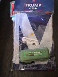 lot 323 image: Rechargeable small flash light LED, NEW & a NEW Trump 2024 Flag