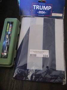 lot 324 image: Large rechargeable flash light New & A NEW tTRUMP 2024 Flag