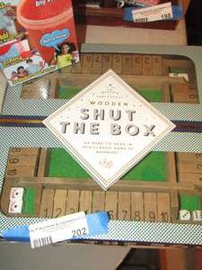 lot 202 image: shut the box game new, slushy magic cup in original box