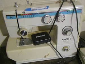 lot 223 image: Necchi Singer Sewing machine with peddle