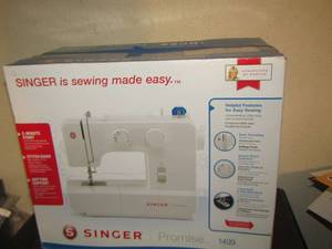 lot 229 image: Singer sewing machine in original box