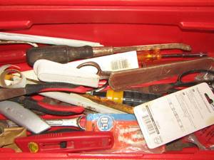 lot 241 image: tool lot wire cutters, screw drivers, putty knifes (in the bottom of red tool box )