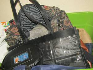 lot 245 image: green tote full of womens purses and handbags, and more
