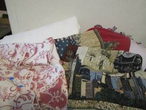 lot 267 image: various throw blankets and a white comforter