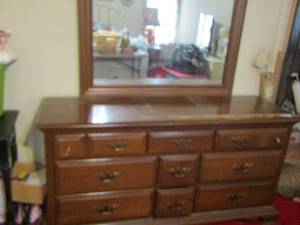 lot 7 image: 9 drawer brown dresser with top mirror, sturdy piece of furniture- 326420