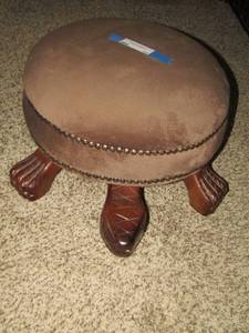lot 13 image: Turtle style foot stool, solid wood patted seating on top
