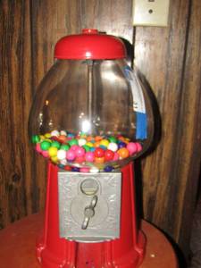 lot 31 image: Vintage red gumball machine, works