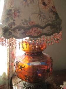 lot 29 image: Brass base side lamp with shade, pink beaded dcor on shade, orange glass lamp, matches # 269