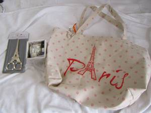 lot 23 image: new Paris coffee cup with spoon, Eiffel tower scissors, large Paris handbag