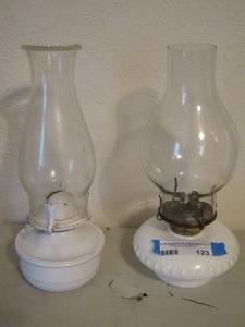 lot 123 image: 1 MILK GLASS OIL LAMP, 1 WHITE METAL OIL LAMP