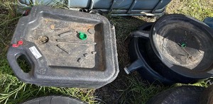 lot 260 image: Used oil pans all empty some may have water in them