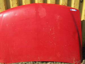 lot 21 image: Chevy hood for truck, year unknown