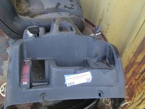lot 28 image: Lawn mower set up where key and shifter goes, only placement no mower included